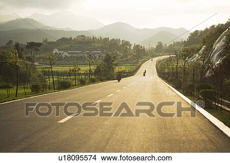 Road beside hill View Large Photo Image Picture - Road beside hill. Fotosearch
