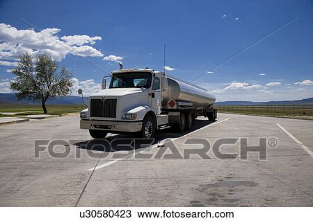 Stock Image - Tanker truck on road. Fotosearch