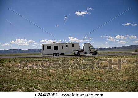 Stock Image - USA, Truck on road. Fotosearch