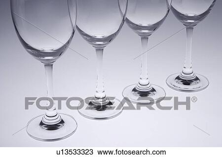 Stock Image - Glasses in a row. Fotosearch
