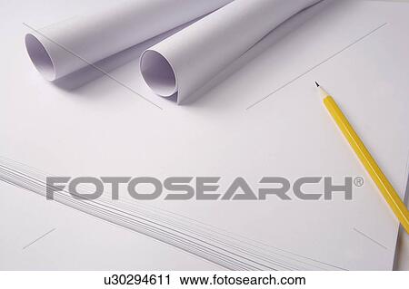 Stock Image - Pencil and rolled up papers. Fotosearch
