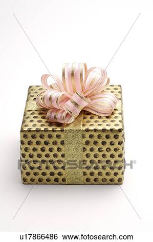 Stock Photograph - Close-up of a wrapped gift with beautiful packaging. Fotosearch