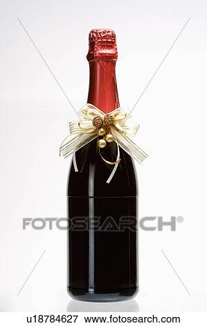Close-up of a bottle of wine for celebration View Large Photo Image Stock Photo - Close-up of a bottle of wine for celebration. Fotosearch