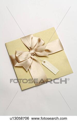 Close-up of a card with bowknot View Large Photo Image Stock Photograph - Close-up of a card with bowknot. Fotosearch