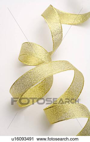 Close-up of a golden ribbon View Large Photo Image Stock Image - Close-up of a golden ribbon. Fotosearch
