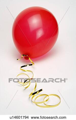 Picture - Close-up of a red balloon. Fotosearch