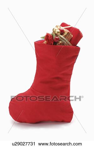 Close-up of a red Christmas stocking View Large Photo Image Stock Image - Close-up of a red Christmas stocking. Fotosearch