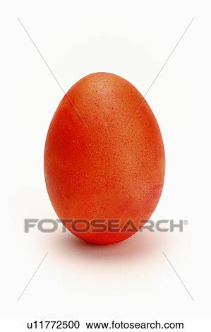 Stock Image - Close-up of a red egg. Fotosearch