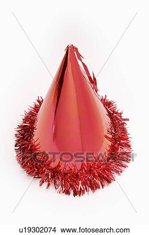 Close-up of a red party hat View Large Photo Image Picture - Close-up of a red party hat. Fotosearch