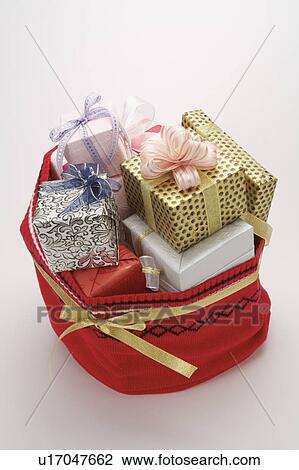 Stock Image - Close-up of a stack of wrapped gifts. Fotosearch