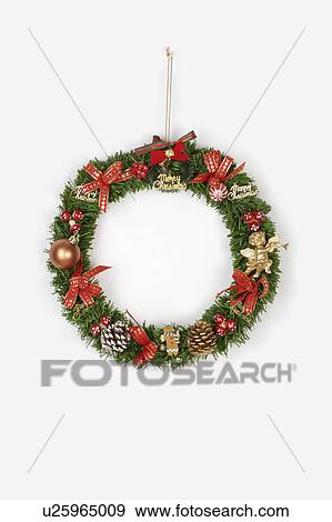Close-up of a wreath of Christmas decoration View Large Photo Image Stock Photo - Close-up of a wreath of Christmas decoration. Fotosearch