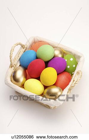 Close-up of Easter eggs in a basket View Large Photo Image Stock Photograph - Close-up of Easter eggs in a basket. Fotosearch