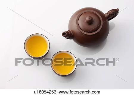 Close-up of a teapot and two cups of tea View Large Photo Image Stock Image - Close-up of a teapot and two cups of tea. Fotosearch