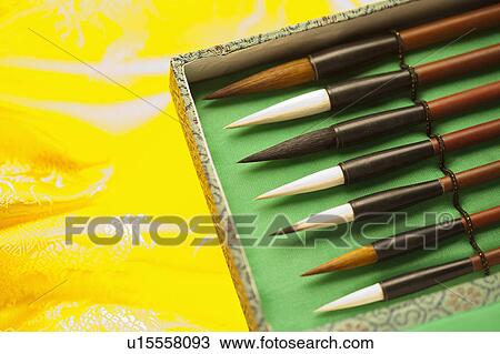 "Close-up of ink brushes in a box, in a row" View Large Photo Image Stock Image - "Close-up of ink brushes in a box, in a row". Fotosearch