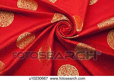 Stock Photo - Close-up of red textile with lucky pattern of Chinese style. Fotosearch