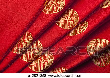 Close-up of red textile with lucky patterns View Large Photo Image Stock Photo - Close-up of red textile with lucky patterns. Fotosearch