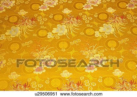 Stock Image - Close-up of textile with lucky pattern of Chinese style. Fotosearch