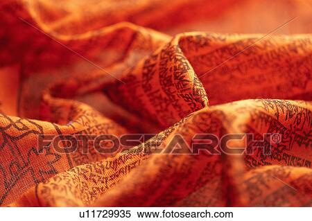 Stock Photography - Close-up of textile with texts of Tibetan and Qiang culture. Fotosearch