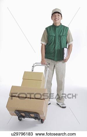 Delivery-person with box and clipboard View Large Photo Image Stock Image - Delivery-person with box and clipboard. Fotosearch