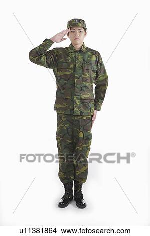 Young male soldier saluting and standing View Large Photo Image Picture - Young male soldier saluting and standing. Fotosearch