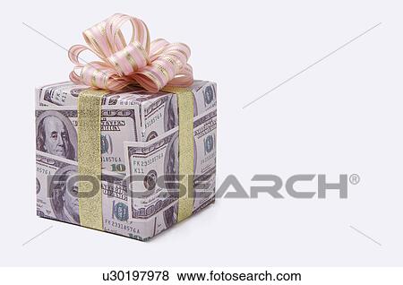 Stock Photo - Cube made of paper money. Fotosearch