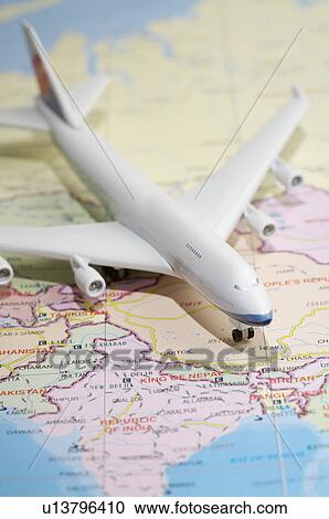 Model Airplane on a map View Large Photo Image Stock Image - Model Airplane on a map. Fotosearch