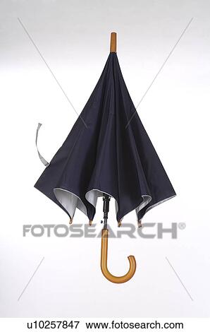Umbrella folded View Large Photo Image Stock Photo - Umbrella folded. Fotosearch