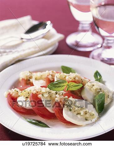 Picture - A Tomato And Mozzarella Salad. Fotosearch