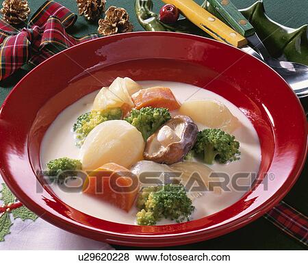 Stock Photo - Boiled Broccoli With Milk. Fotosearch