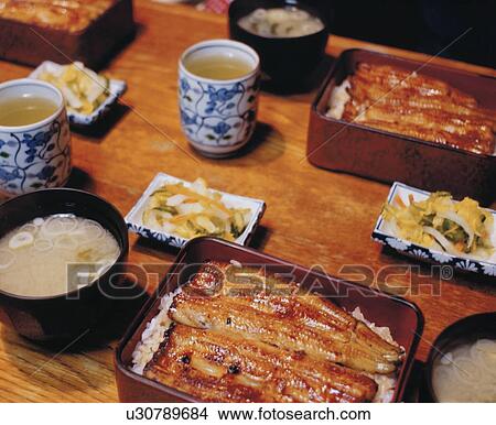 Broiled Eels On Rice View Large Photo Image Picture - Broiled Eels On Rice. Fotosearch