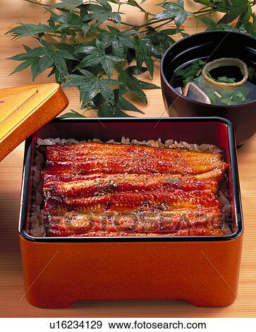Stock Photo - Broiled Eels On Rice. Fotosearch