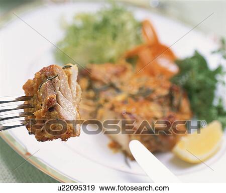 Stock Photo - Chicken Baked With Herb. Fotosearch