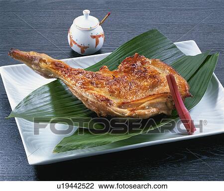 Stock Image - Grilled Chicken Thigh. Fotosearch