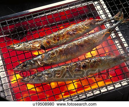 Stock Image - Pacific Saury Grilled With Salt. Fotosearch
