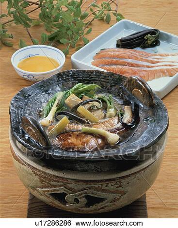 Stock Photograph - Pot Of Trout And Edible Wild Plant. Fotosearch