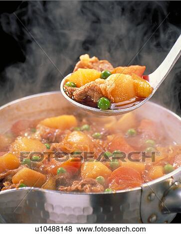 Stock Photo - Potatoes Stewed With Pork. Fotosearch