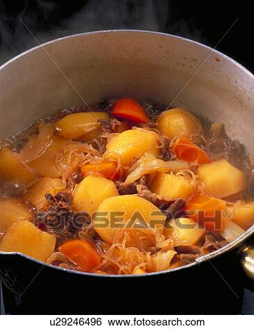 Stock Photograph - Potatoes Stewed With Pork. Fotosearch