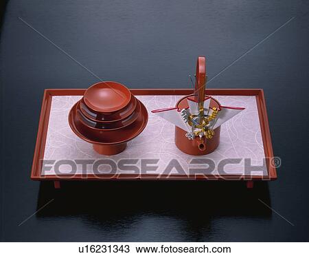 Stock Image - Sake Server For New York. Fotosearch