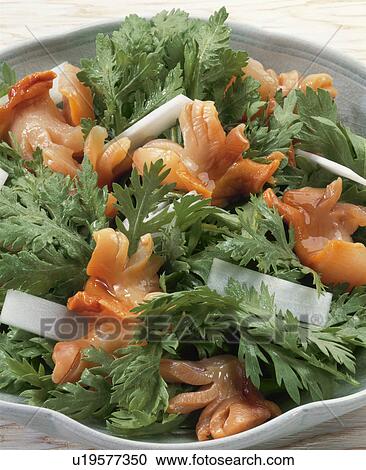 Stock Image - Salad Of Ark Shell And Garland Chrysanthemum. Fotosearch