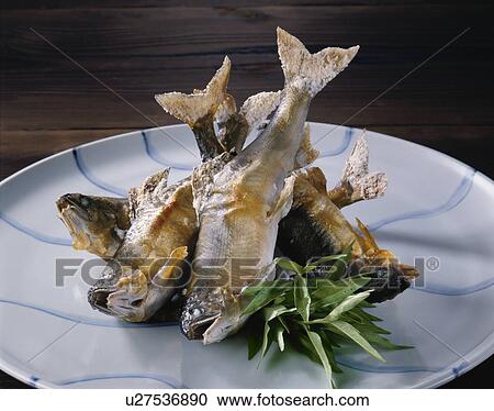 Stock Image - Sweetfish Grilled With Salt. Fotosearch