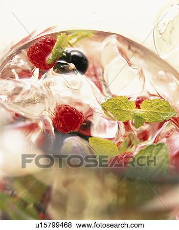 Stock Photo - A Blueberry, Raspberry. Fotosearch