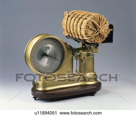 Stock Image - Balance, Straw Rice Bag. Fotosearch