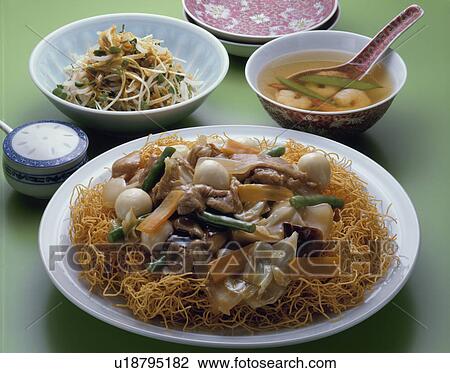 Stock Image - Fried Noodles Of Chinese Thick And Starchy Sauce. Fotosearch