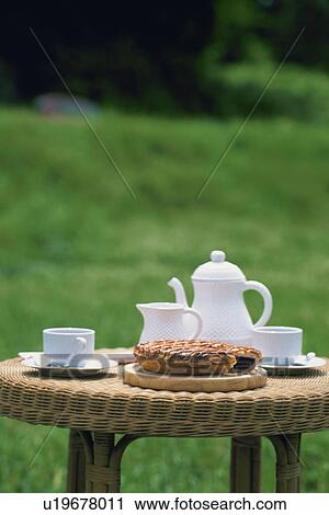 Stock Image - Teatime, Outdoors. Fotosearch