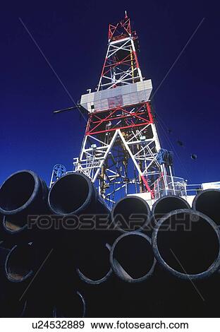 Stock Photo - Drill Pipe and Derrick on Offshore Oil Drilling Rig. Fotosearch