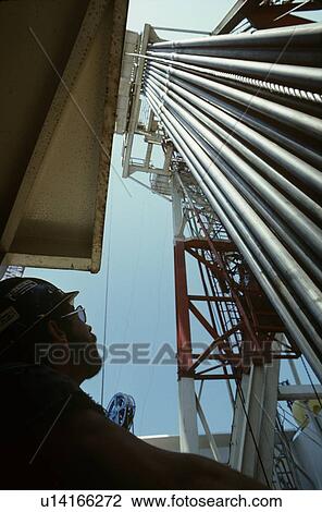 Driller Looking Upward at Drill Pipe View Large Photo Image Stock Image - Driller Looking Upward at Drill Pipe. Fotosearch