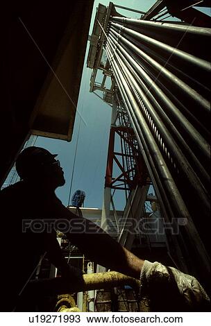 Driller Looking Upward at Drill Pipe View Large Photo Image Stock Image - Driller Looking Upward at Drill Pipe. Fotosearch