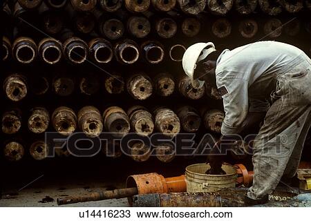 Drilling Rig Worker Cleaning Drill Pipe View Large Photo Image Stock Image - Drilling Rig Worker Cleaning Drill Pipe. Fotosearch