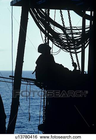 Drilling Rig Worker Looking Upward View Large Photo Image Stock Photograph - Drilling Rig Worker Looking Upward. Fotosearch