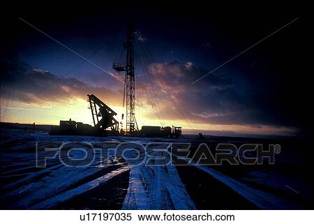 Stock Photography - Drillsite at Sunset. Fotosearch